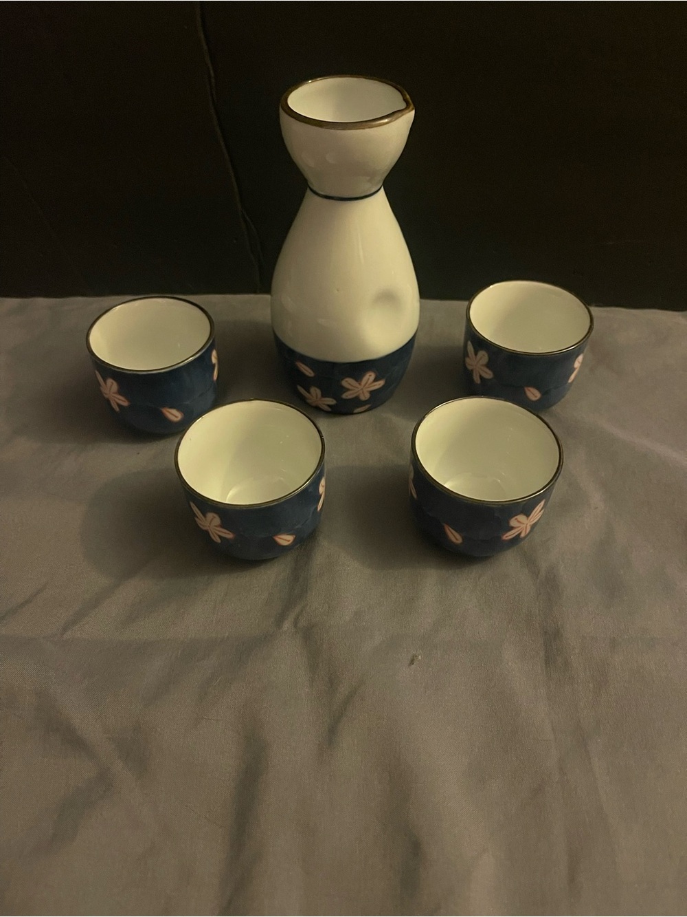 Ceramic Sake Set with Blue Floral Cups and White Pourer